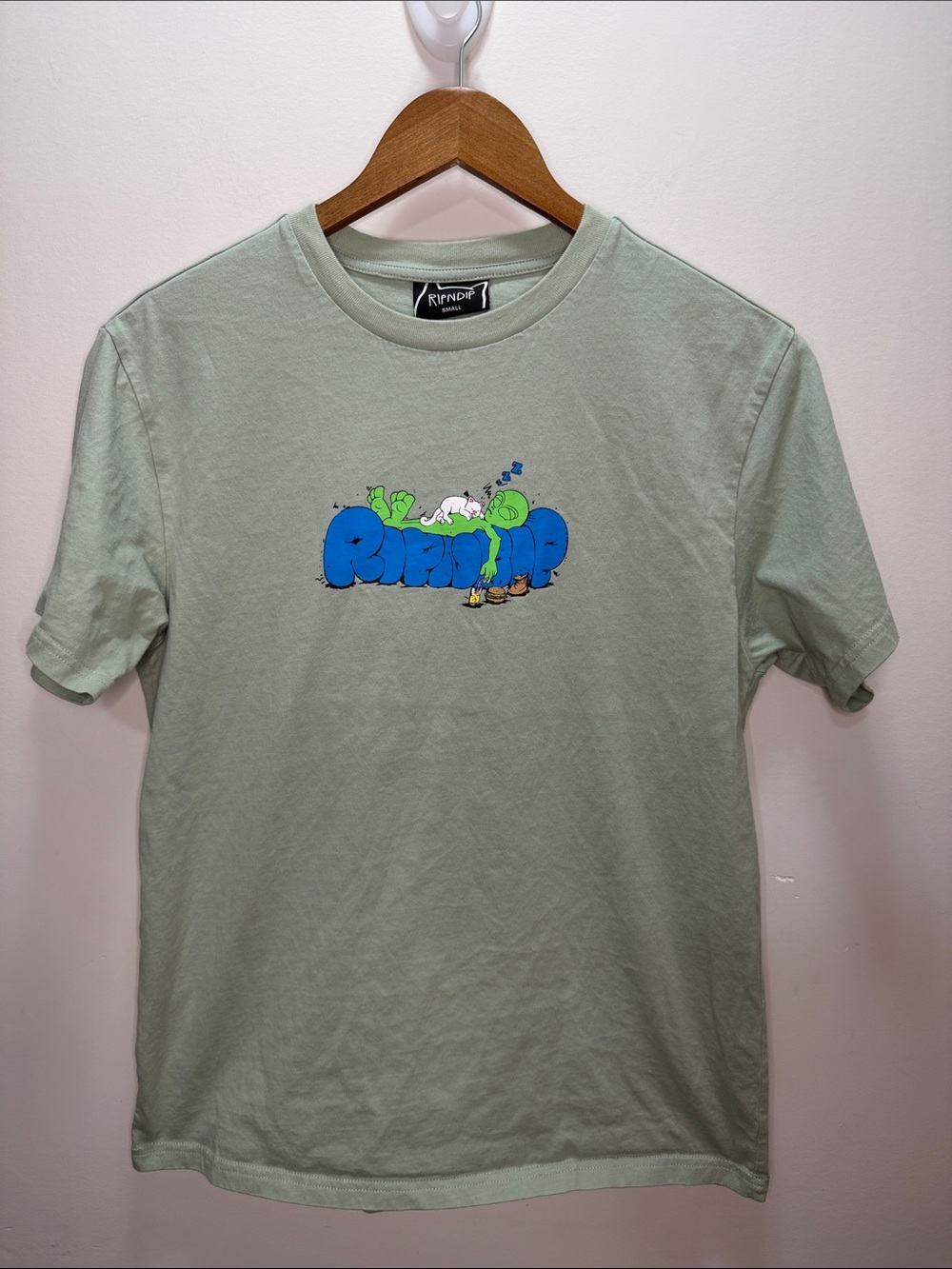 Ripndip Sage Green Tee with Blue & Lime Graphic - Men Size S 26.5x20